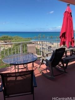 85-003 Pokai Bay Street, Unit 403 Waianae, HI 96792 - Photo 3 of 22 a view of a balcony with two chairs and a table