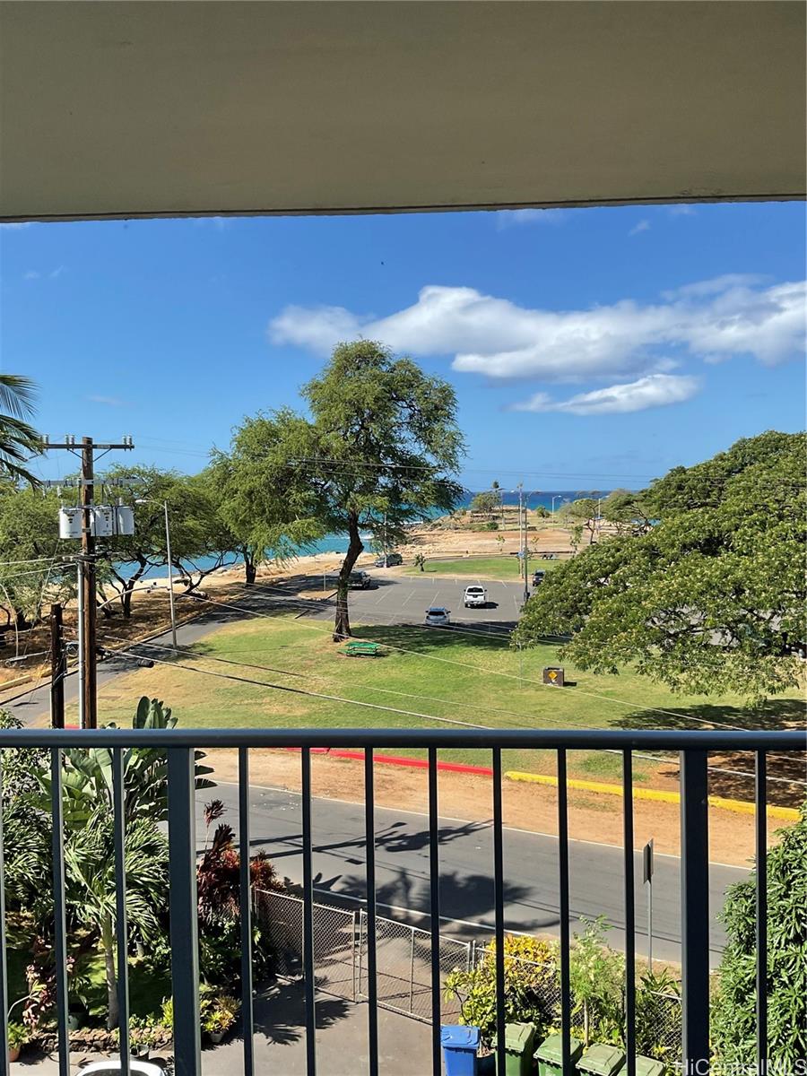 85-003 Pokai Bay Street, Unit 403 Waianae, HI 96792 - Photo 5 of 22 a view of a street with an ocean view