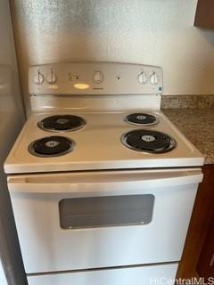 85-003 Pokai Bay Street, Unit 403 Waianae, HI 96792 - Photo 10 of 22 a stove top oven sitting inside of a appliances