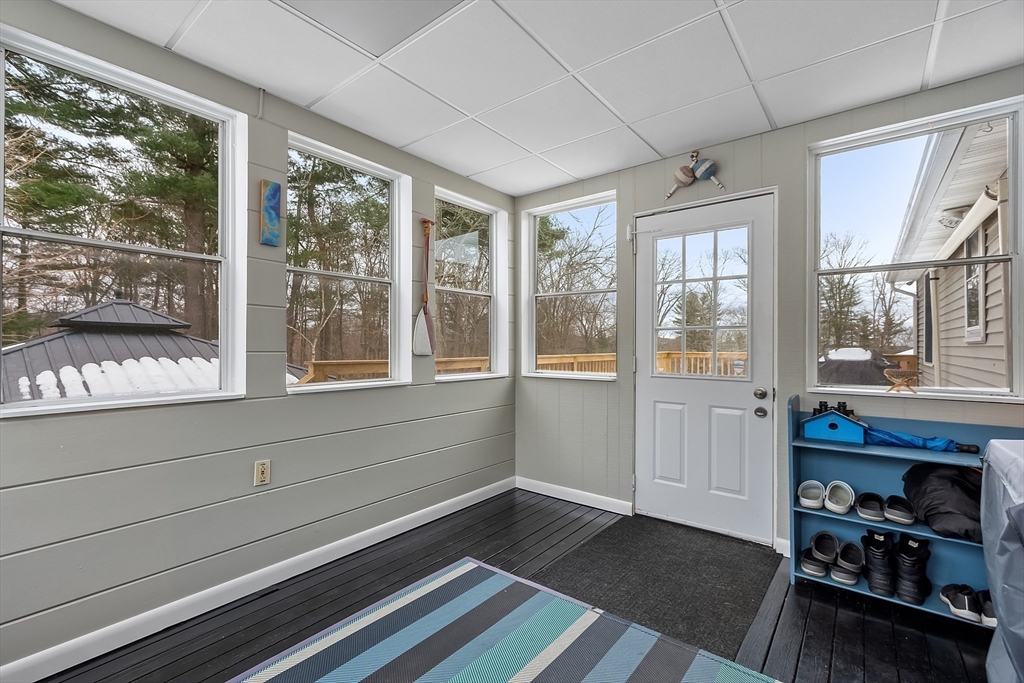 24 George Street Charlton, MA 01507 - Photo 13 of 42 a living room with furniture and a large window