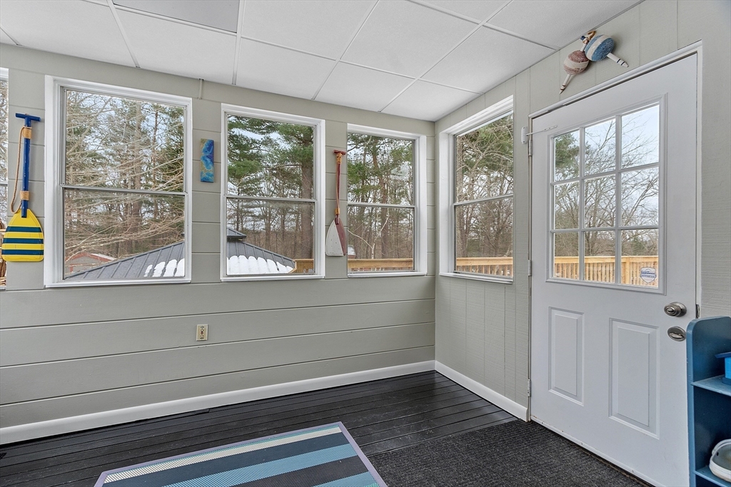 24 George Street Charlton, MA 01507 - Photo 14 of 42 a view of empty room with wooden floor and fan