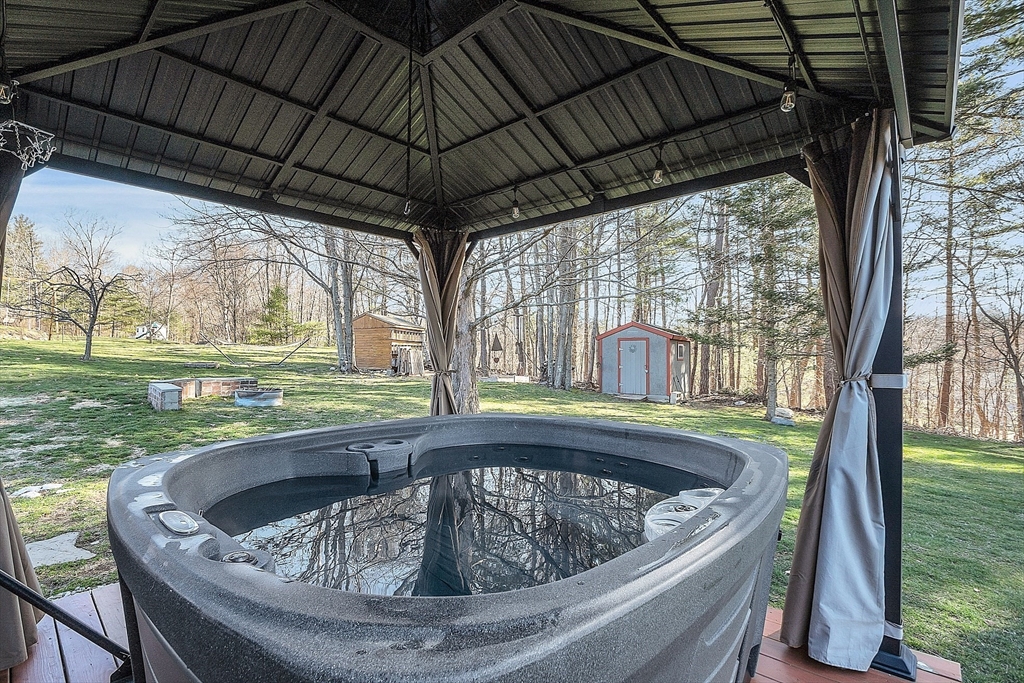 24 George Street Charlton, MA 01507 - Photo 5 of 42 a view of swimming pool with outdoor seating