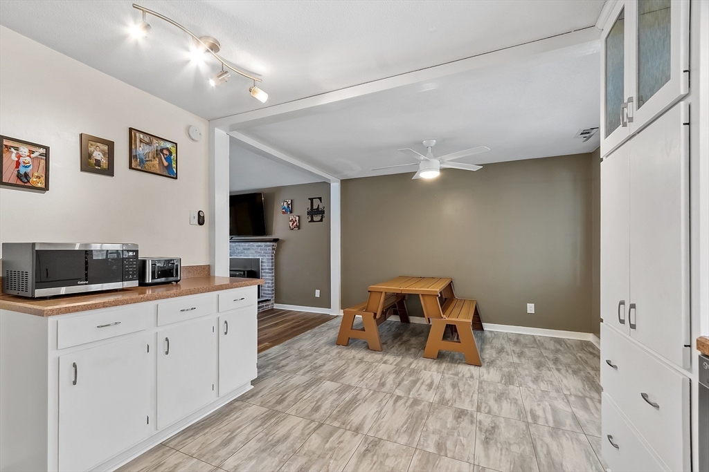 24 George Street Charlton, MA 01507 - Photo 10 of 42 a room with furniture and wooden floor