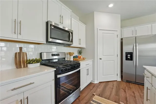 $403,990 | 606 Fallen Leaf Drive, Belton, MO 64012