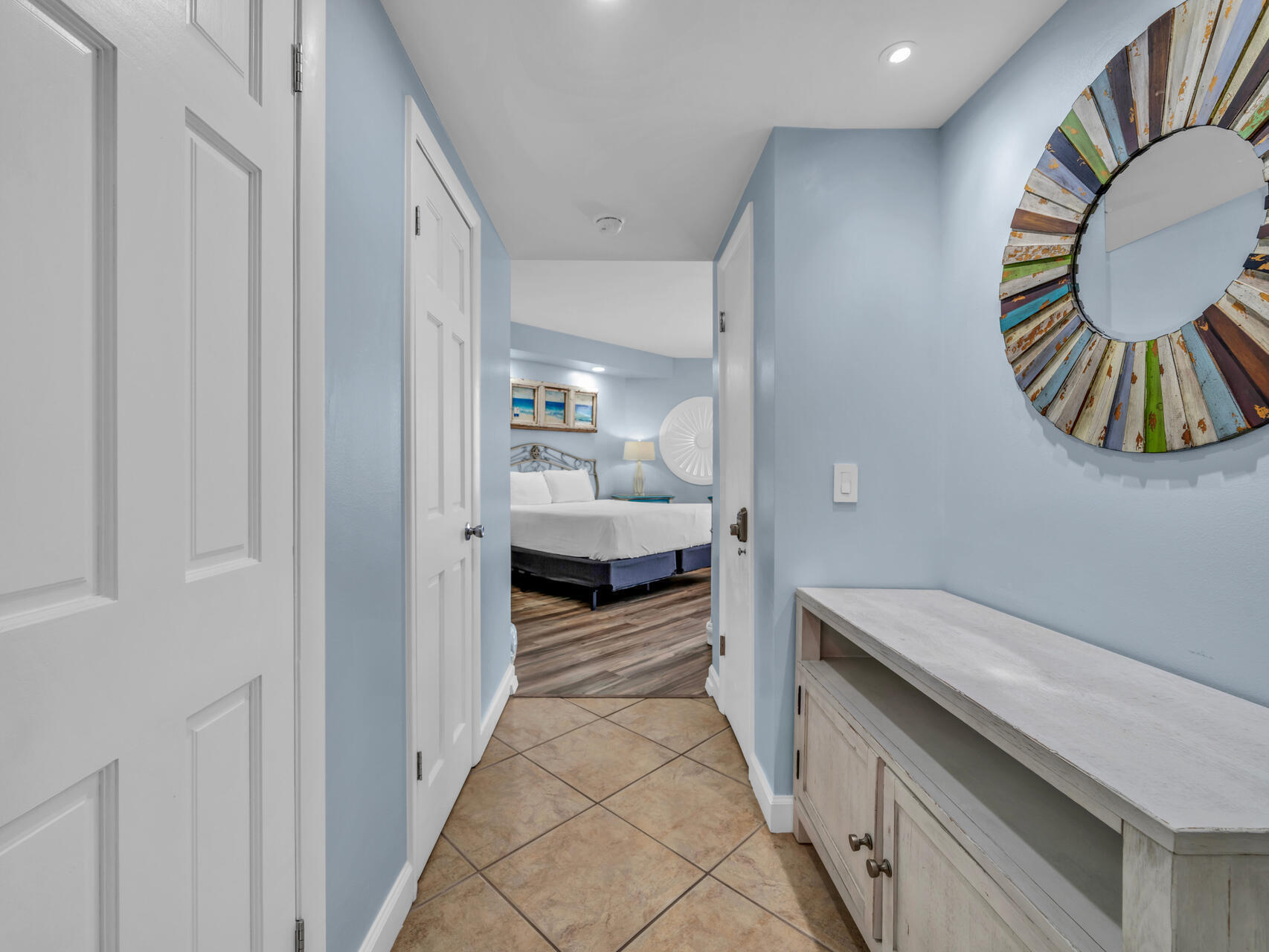 1096 Scenic Gulf Drive, Unit 1401/1401A Miramar Beach, FL 32550 - Photo 13 of 77 a view of a bedroom from a hallway