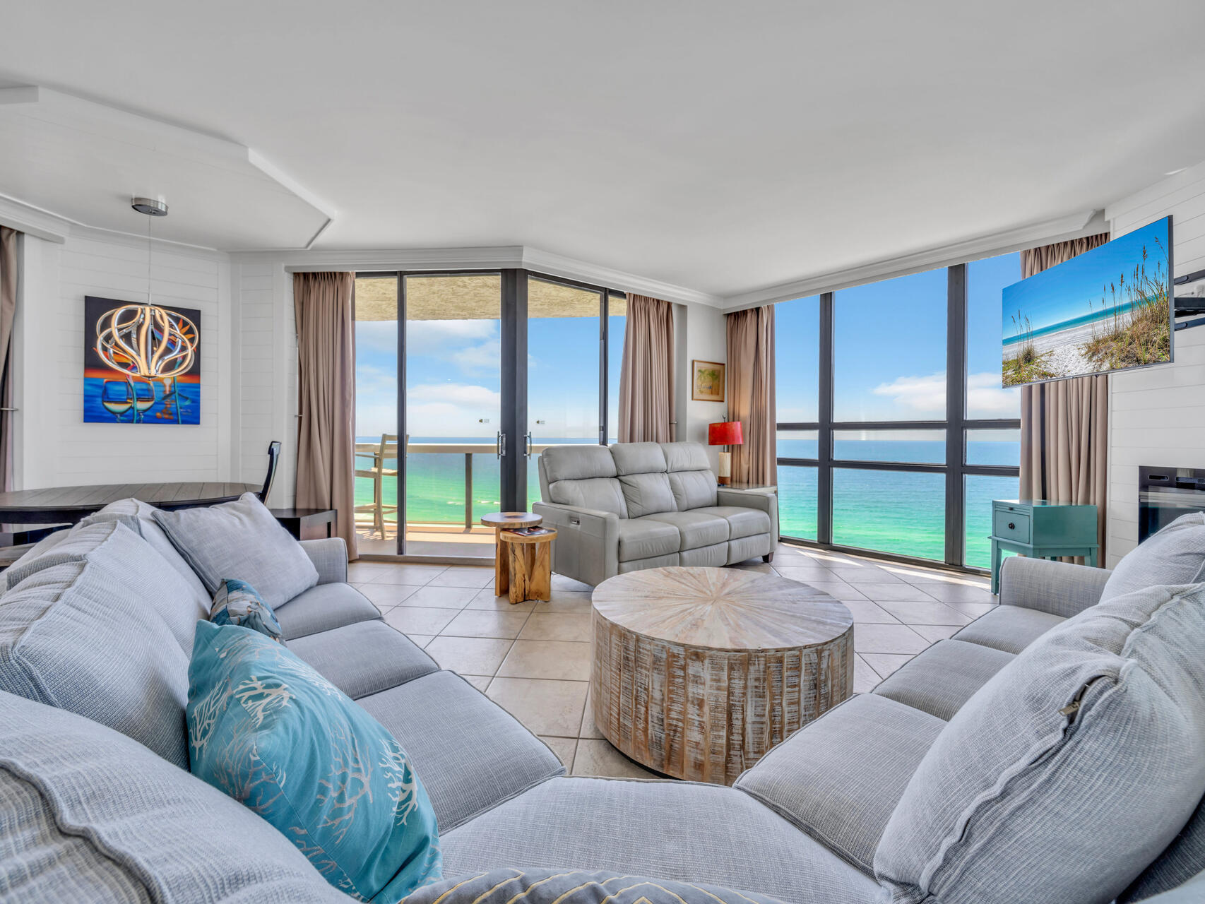 1096 Scenic Gulf Drive, Unit 1401/1401A Miramar Beach, FL 32550 - Photo 25 of 77 a living room with furniture and a large window