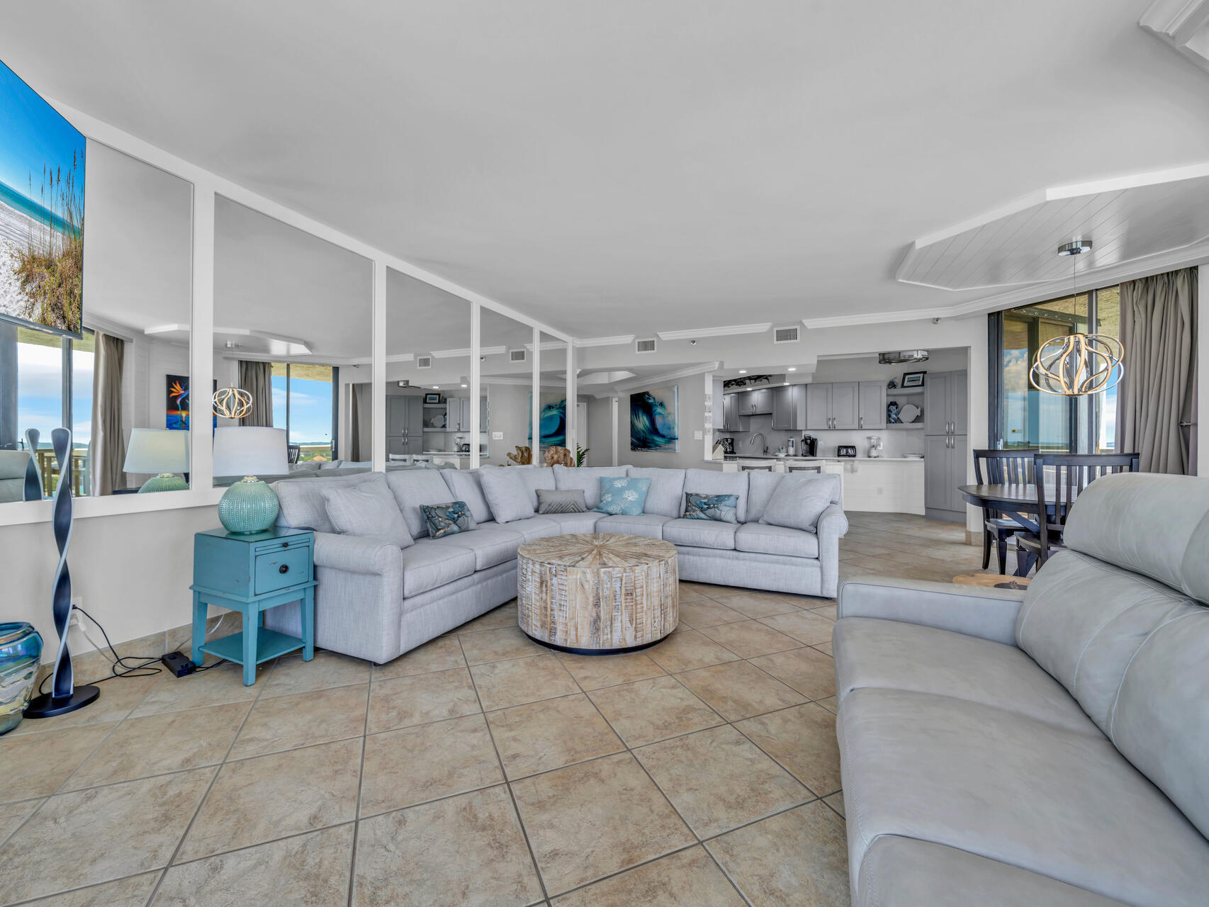 1096 Scenic Gulf Drive, Unit 1401/1401A Miramar Beach, FL 32550 - Photo 27 of 77 a living room with furniture and a large window