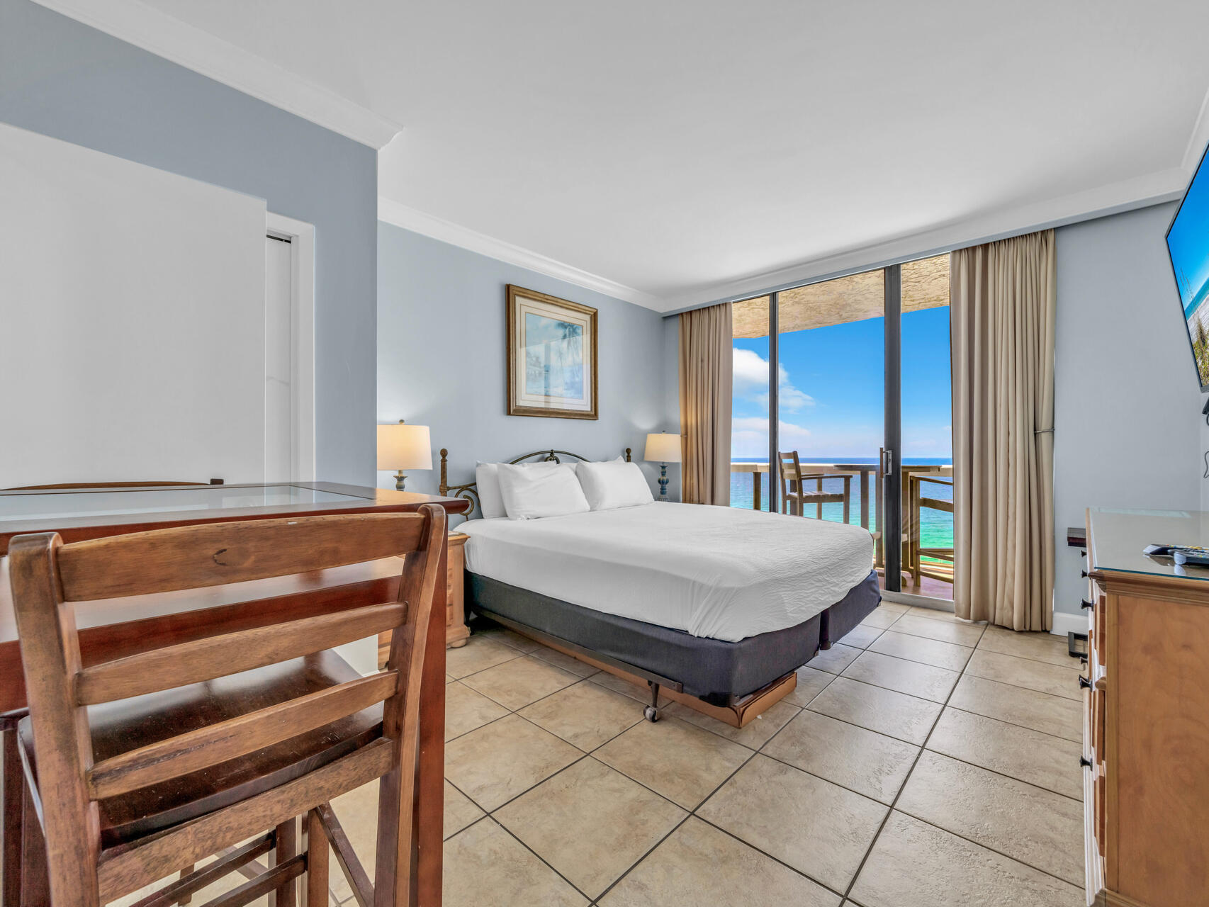 1096 Scenic Gulf Drive, Unit 1401/1401A Miramar Beach, FL 32550 - Photo 34 of 77 a bedroom with a bed and a window