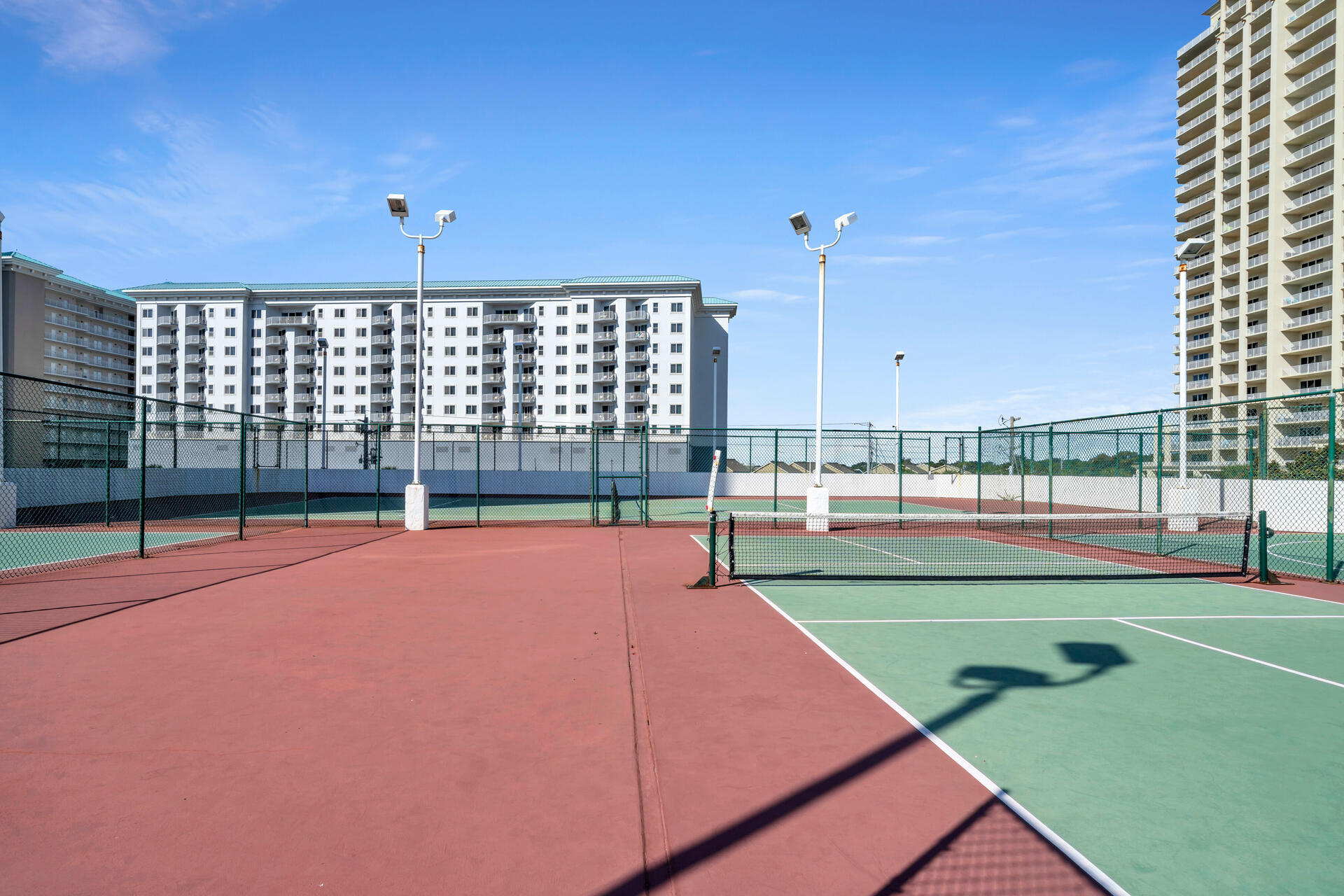 1096 Scenic Gulf Drive, Unit 1401/1401A Miramar Beach, FL 32550 - Photo 61 of 77 a view of an empty room with a floor to ceiling window and wooden floor