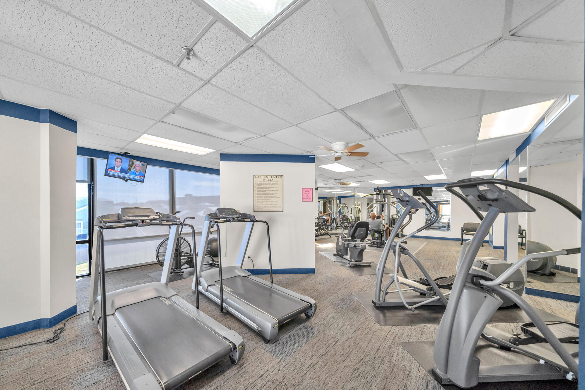 1096 Scenic Gulf Drive, Unit 1401/1401A Miramar Beach, FL 32550 - Photo 68 of 77 a view of a room with gym equipment