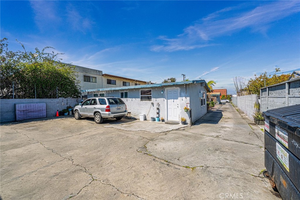 1414 West 224th Street Torrance, CA 90501 - Photo 4 of 12 a car parked in front of house
