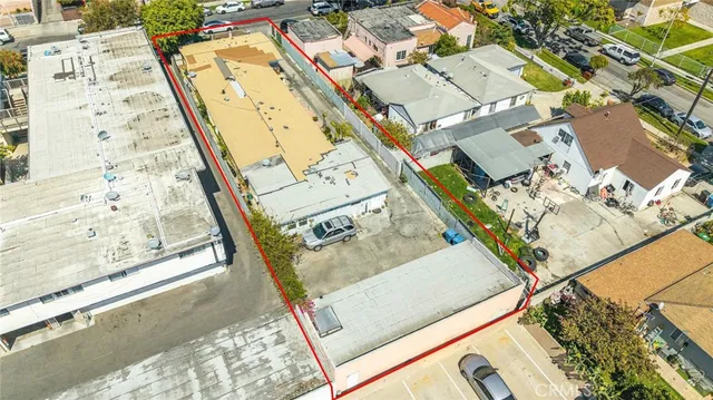 an aerial view of a house with a ocean view