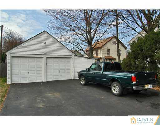 400 Bound Brook Road Middlesex, NJ 08846 - Photo 11 of 11 a car parked in front of a house