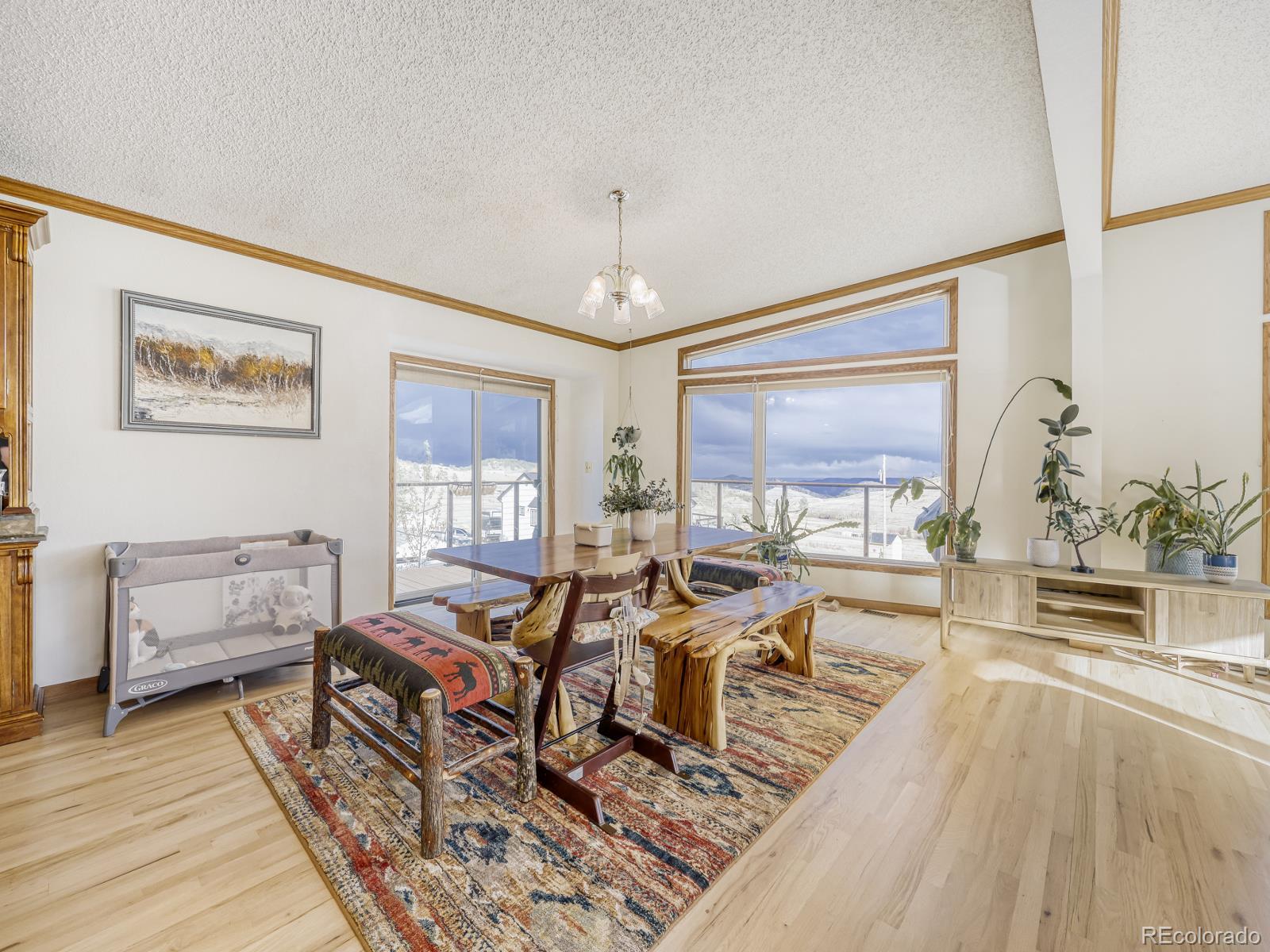 32020 Robinson Hill Road Golden, CO 80403 - Photo 12 of 28 a living room with furniture and a large window