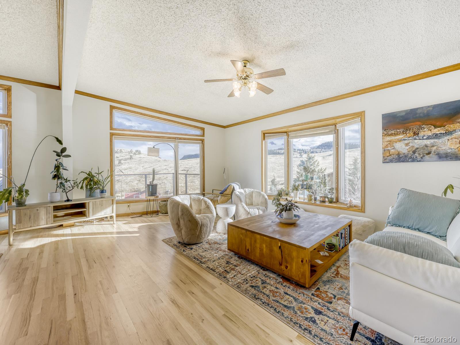 32020 Robinson Hill Road Golden, CO 80403 - Photo 15 of 28 a living room with furniture and a large window