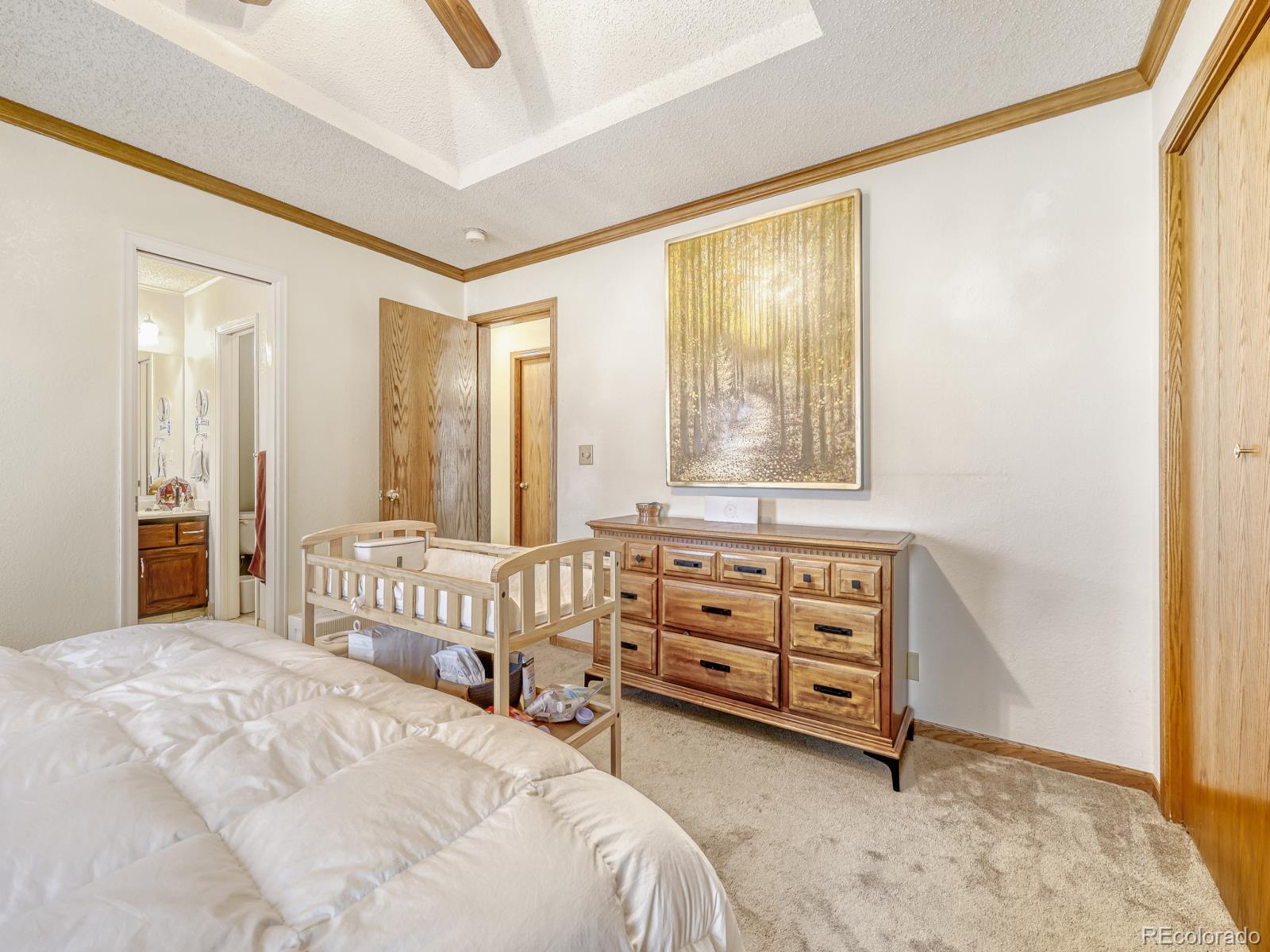 32020 Robinson Hill Road Golden, CO 80403 - Photo 17 of 28 a bedroom with a bed and a window