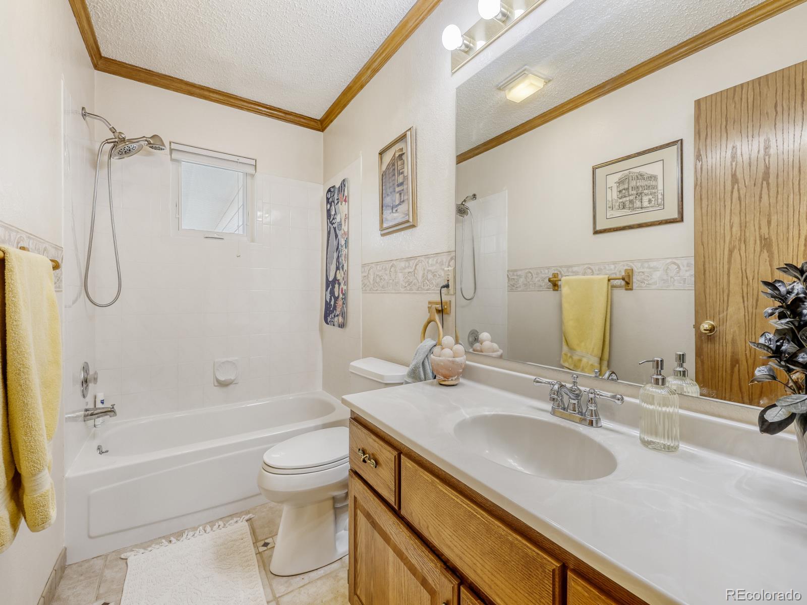 32020 Robinson Hill Road Golden, CO 80403 - Photo 22 of 28 a bathroom with a granite countertop sink toilet and shower