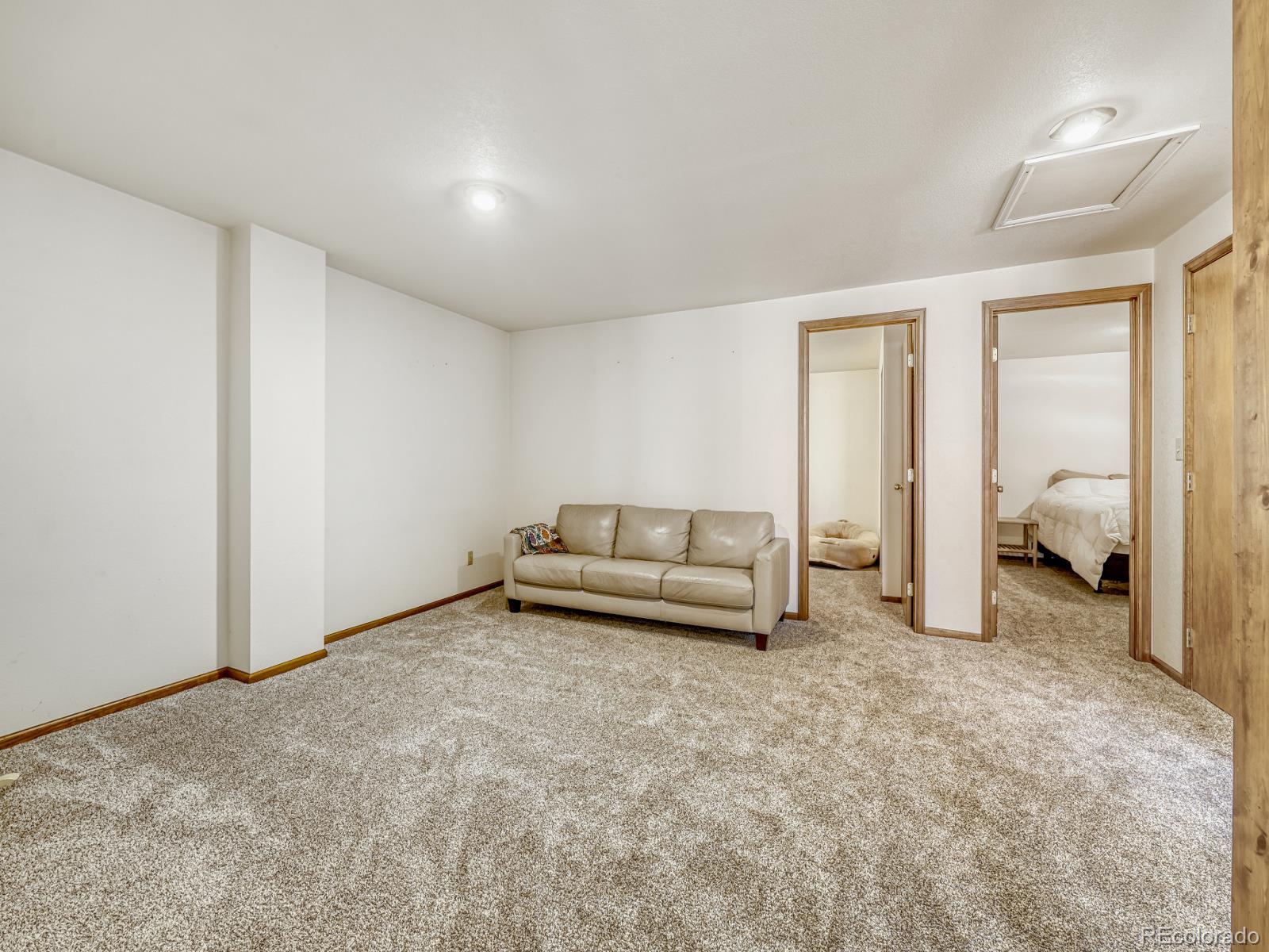 32020 Robinson Hill Road Golden, CO 80403 - Photo 28 of 28 a living room with furniture and a lamp