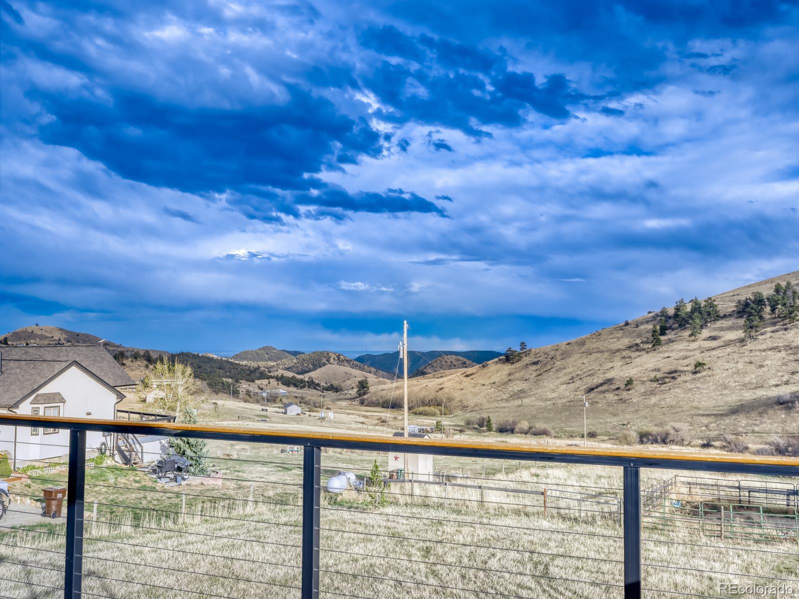 32020 Robinson Hill Road Golden, CO 80403 - Photo 3 of 28 a view of a sky from a balcony