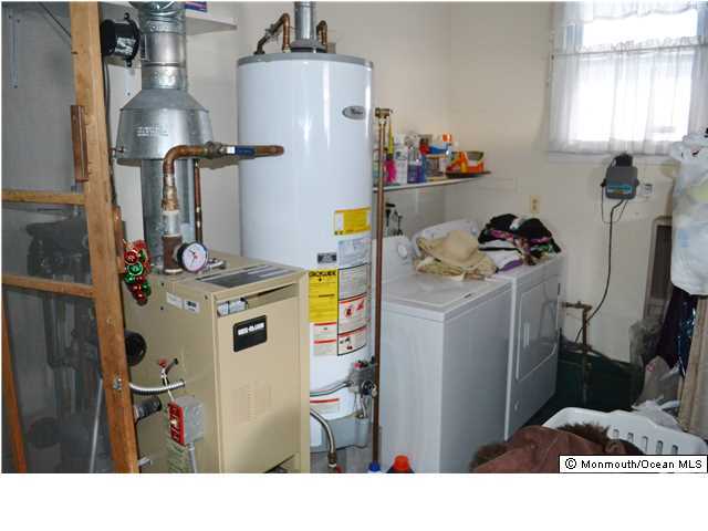 1417 Rue Mirador Point Pleasant, NJ 08742 - Photo 20 of 21 a utility room with sink dryer and washer