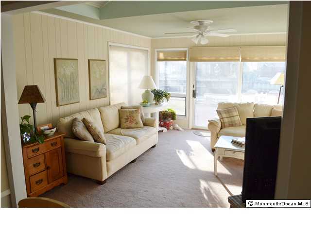 1417 Rue Mirador Point Pleasant, NJ 08742 - Photo 9 of 21 a living room with furniture and a large window