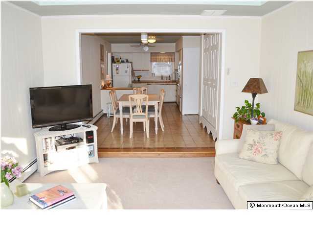 1417 Rue Mirador Point Pleasant, NJ 08742 - Photo 10 of 21 a living room with furniture and a flat screen tv