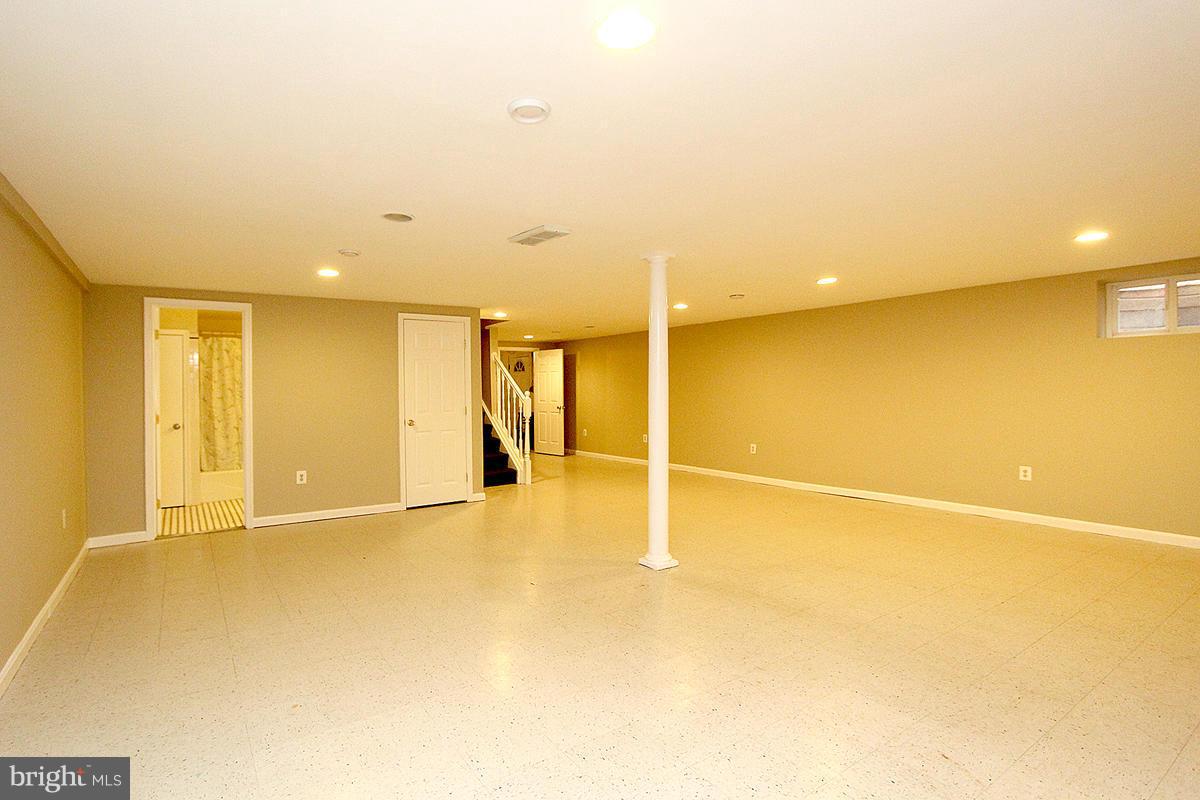 17216 Donora Road Silver Spring, MD 20905 - Photo 23 of 28 a view of an empty room with a window