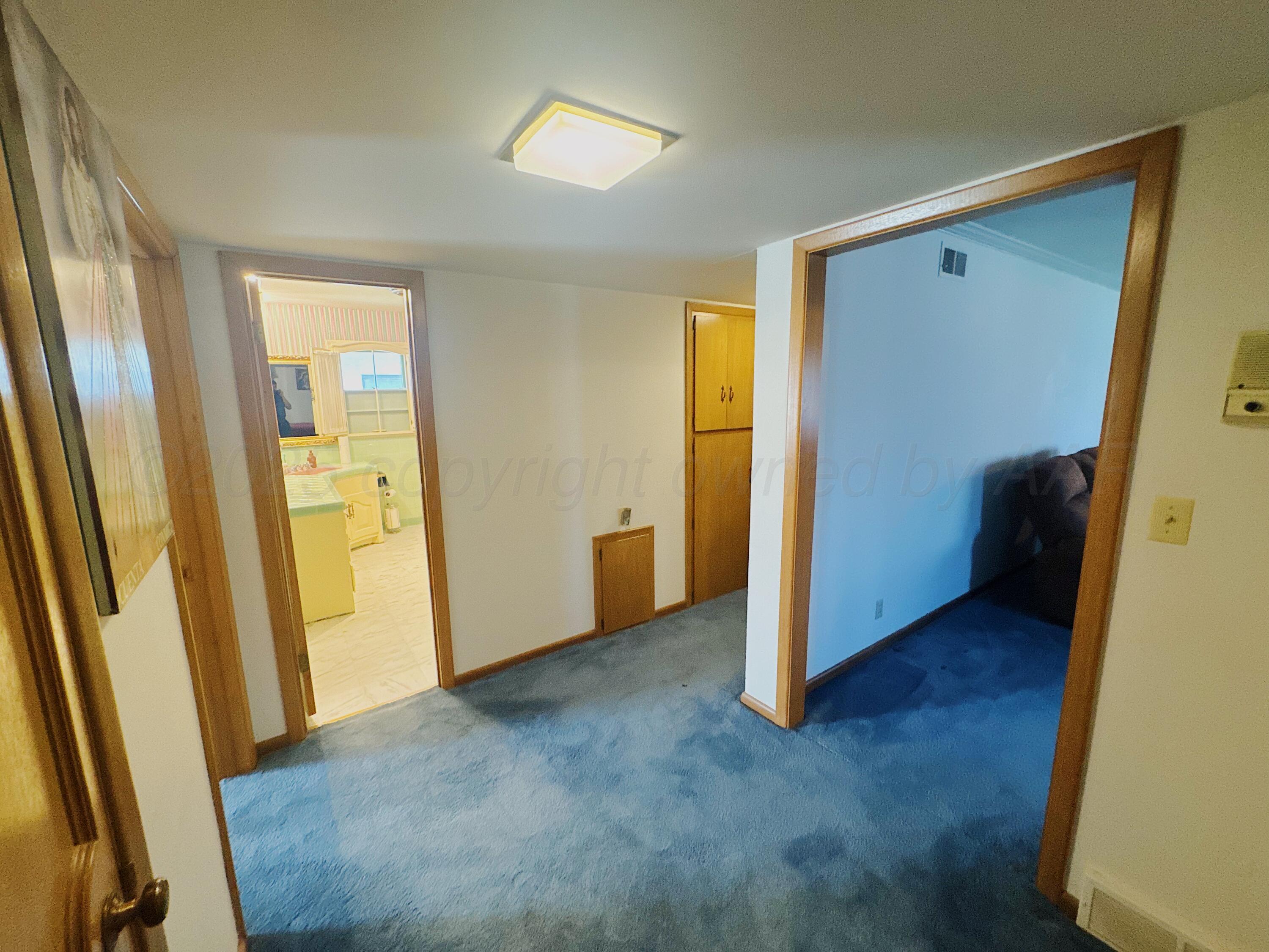 1421 South Fordham Street Perryton, TX 79070 - Photo 15 of 20 a view of entryway with front door