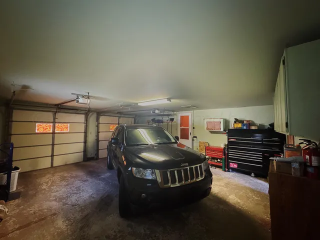 a room with furniture and a chandelier