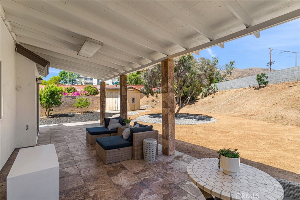 23020 Mansfield Lane Moreno Valley, CA 92557 - Photo 19 of 28 a outdoor living space with furniture and garden view