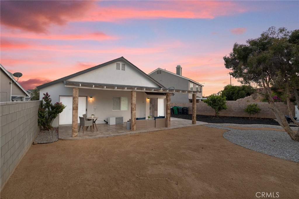 23020 Mansfield Lane Moreno Valley, CA 92557 - Photo 28 of 28 a front view of a house with trees