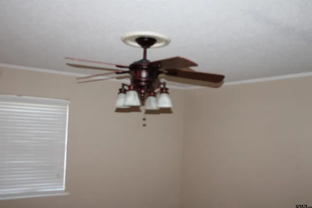 a bathroom with a toilet and a tub