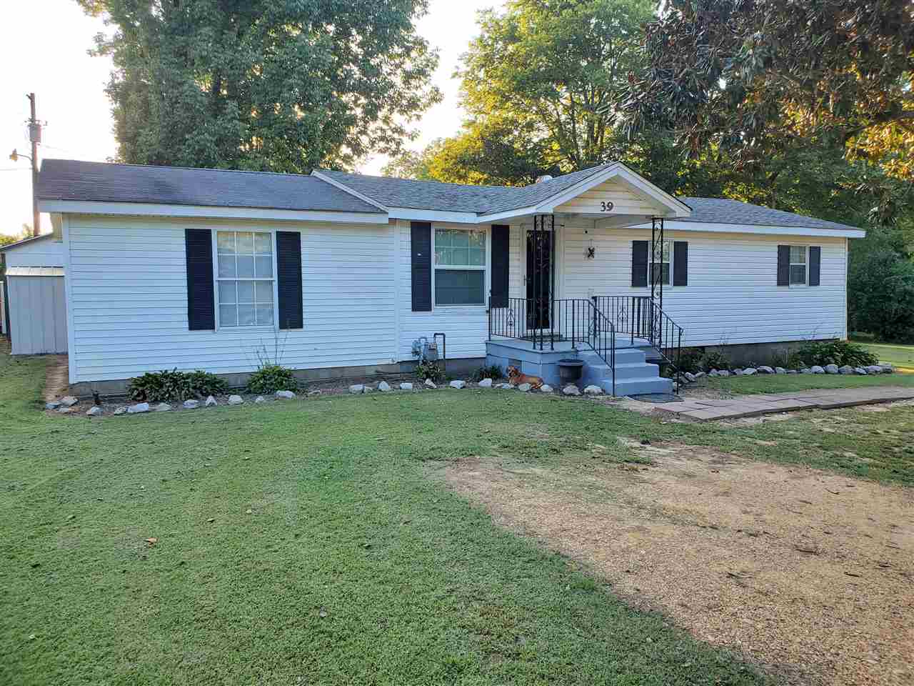39 Clark Lane Ripley, TN 38063 - Photo 2 of 10 a front view of a house with a yard
