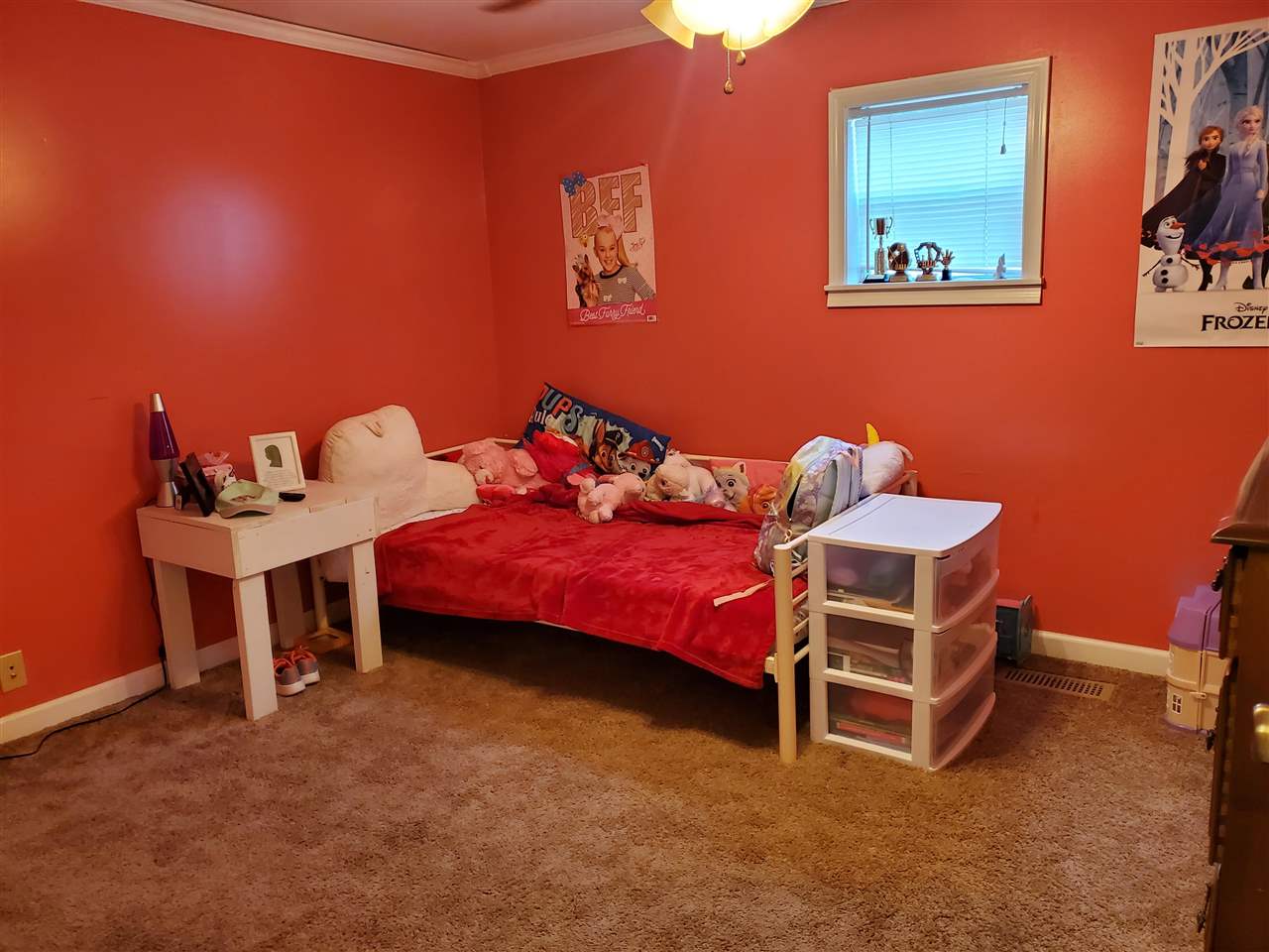 39 Clark Lane Ripley, TN 38063 - Photo 9 of 10 a bedroom with furniture and a bed