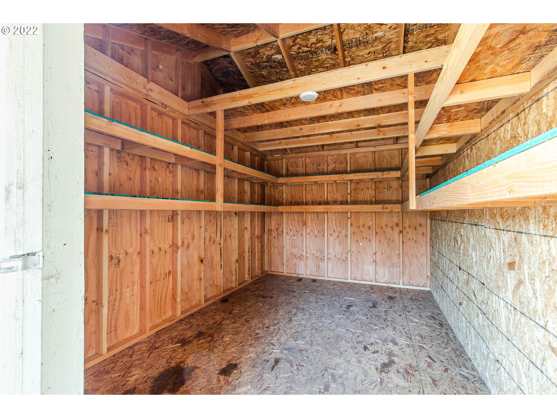 1158 D Street Springfield, OR 97477 - Photo 21 of 24 a view of an empty room with wooden floor