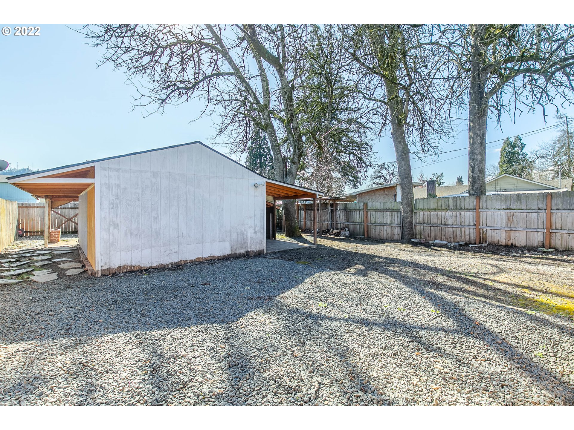 1158 D Street Springfield, OR 97477 - Photo 23 of 24 a view of a yard in front of a house