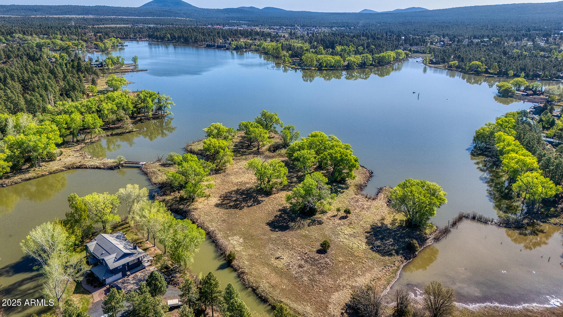 Pinetop-lakeside Larson Road Lakeside, AZ 85929 - Photo 37 of 45 an aerial view of a houses with a lake view