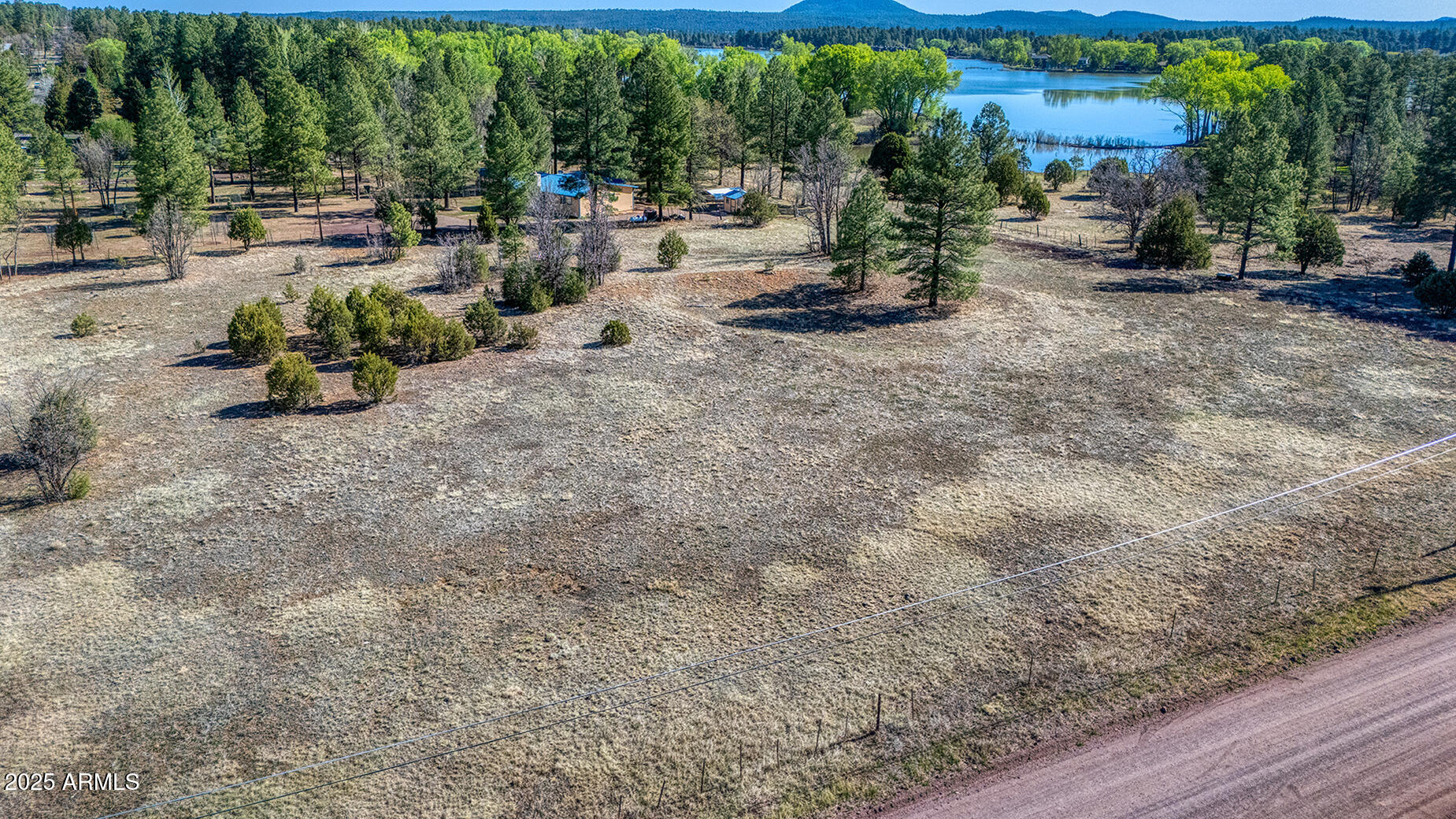 Pinetop-lakeside Larson Road Lakeside, AZ 85929 - Photo 43 of 45 a view of a park with swings and slides