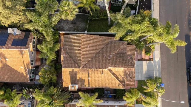 a view of a pathway of a house with a yard