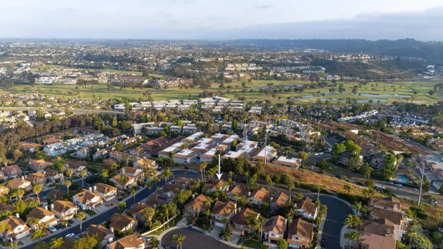 an aerial view of residential building and lake view