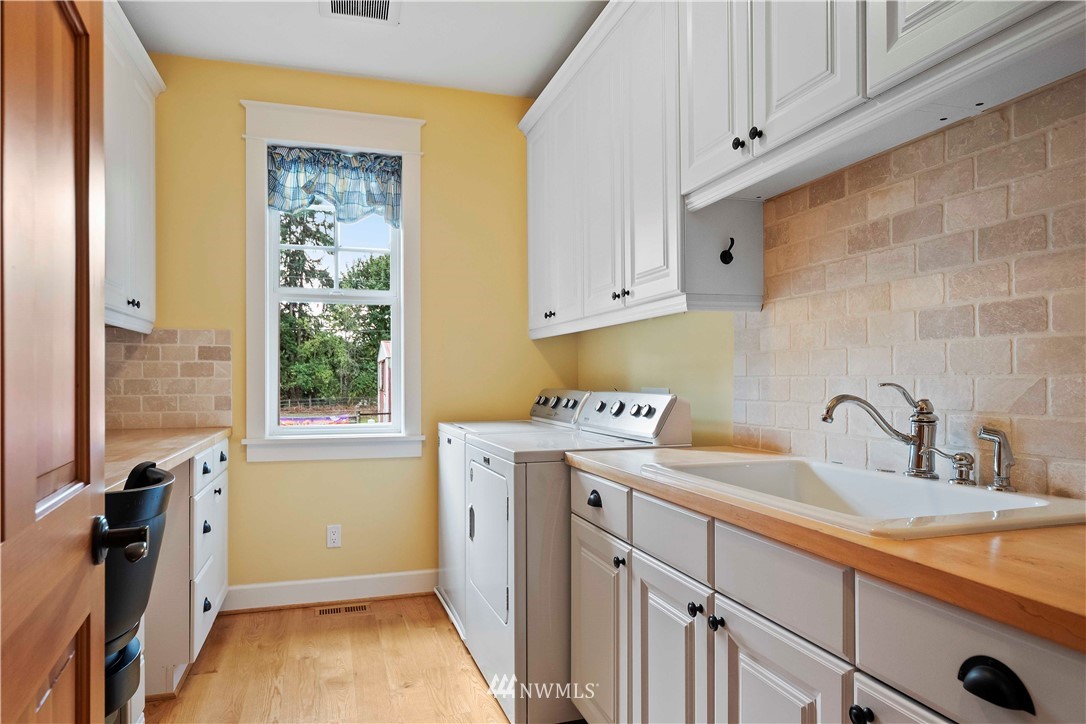 505 208th Street Southeast Bothell, WA 98012 - Photo 14 of 40 a room with a sink cabinets and a window