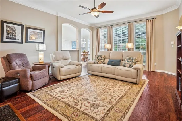 a living room with furniture and a rug