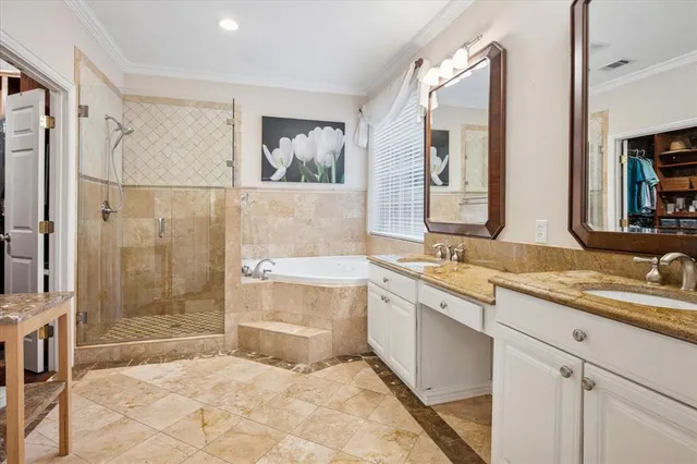 a spacious bathroom with a granite countertop sink mirror and a