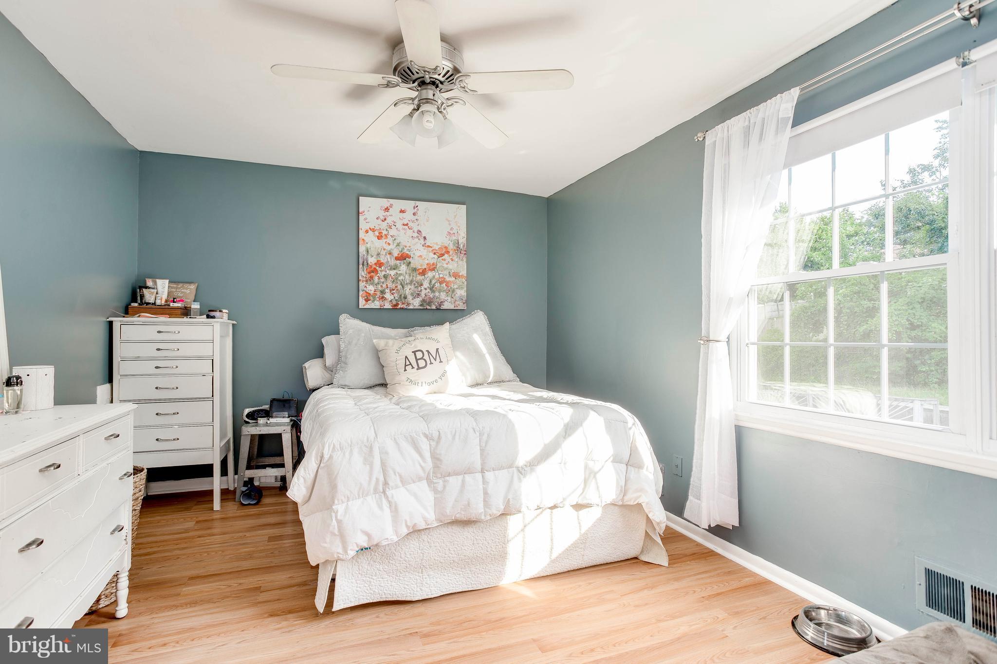 4313 Slater Avenue Baltimore, MD 21236 - Photo 18 of 29 a bedroom with a bed and a window