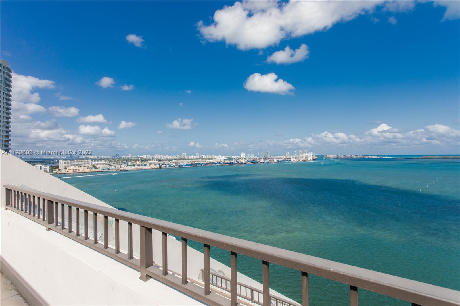 520 Brickell Key Drive, Unit PH03 Miami, FL 33131 - Photo 1 of 75 a view of a balcony with an outdoor space