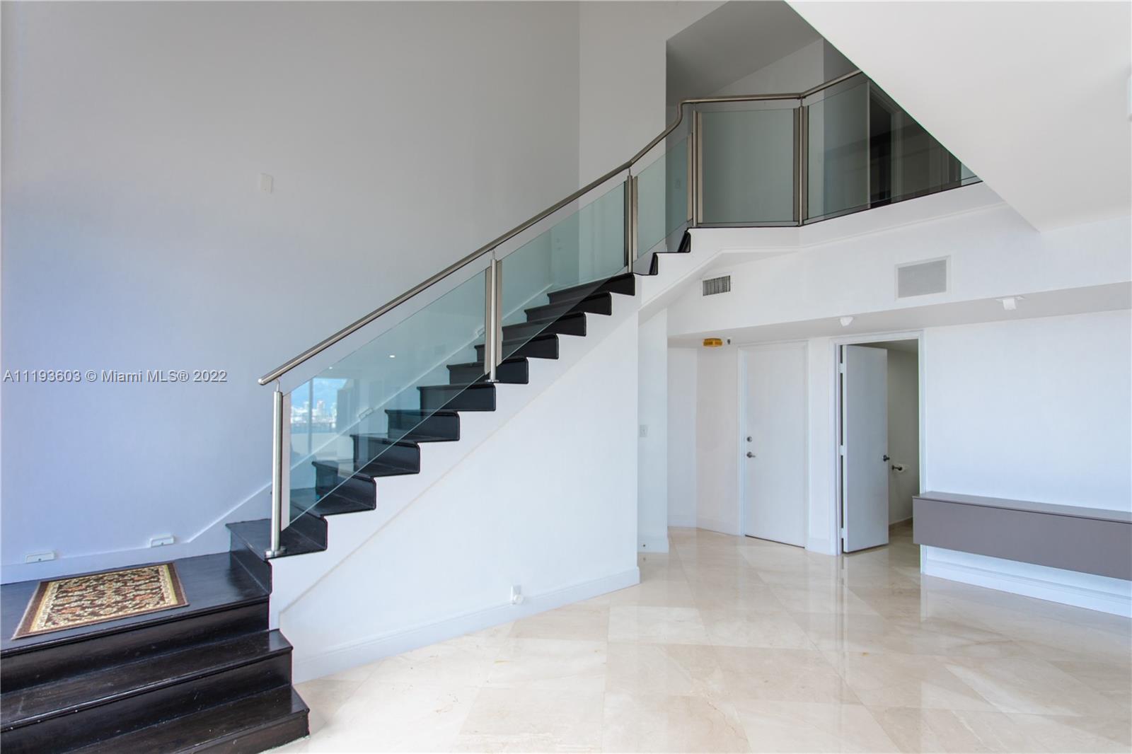 520 Brickell Key Drive, Unit PH03 Miami, FL 33131 - Photo 34 of 75 a view of entryway and hall