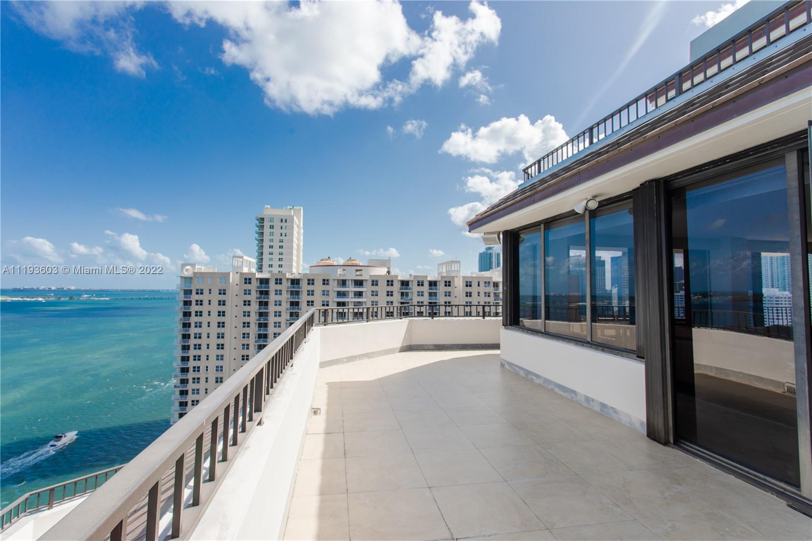 520 Brickell Key Drive, Unit PH03 Miami, FL 33131 - Photo 41 of 75 a view of balcony with yard