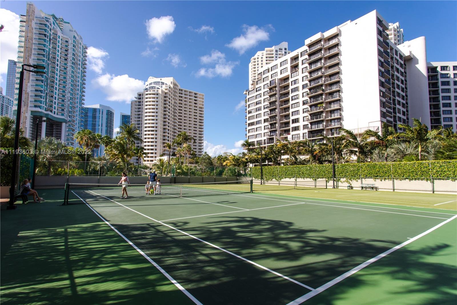 520 Brickell Key Drive, Unit PH03 Miami, FL 33131 - Photo 67 of 75 a view of a tennis ground