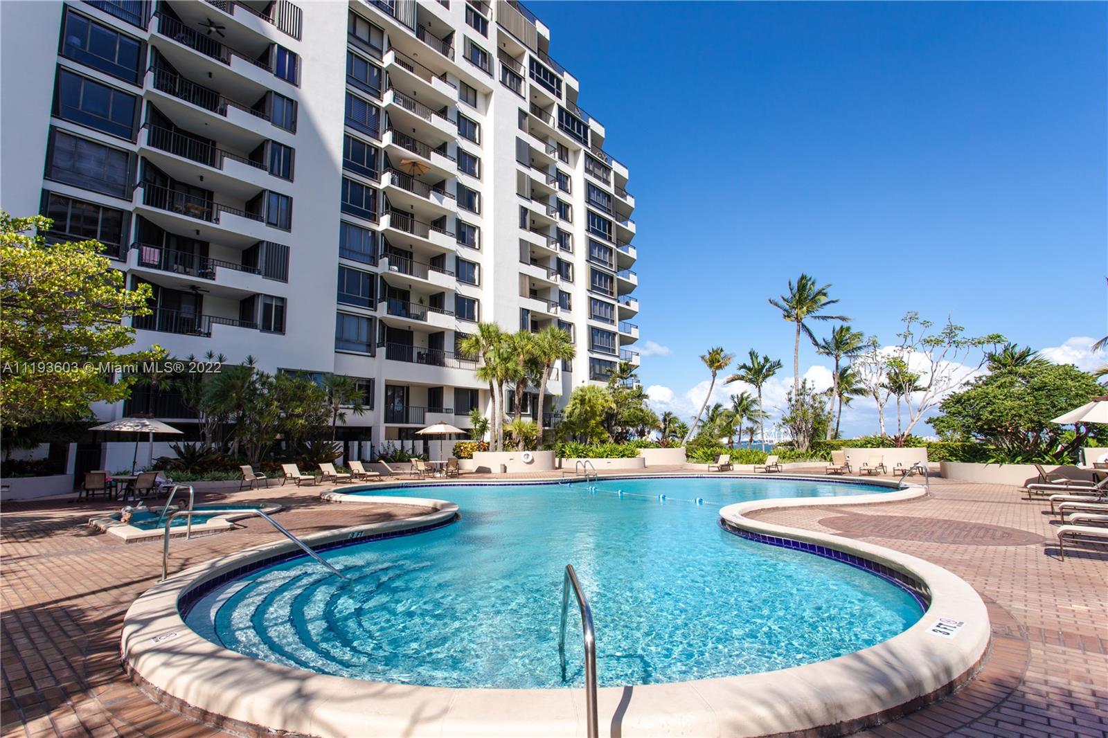 520 Brickell Key Drive, Unit PH03 Miami, FL 33131 - Photo 70 of 75 a view of a swimming pool with a patio