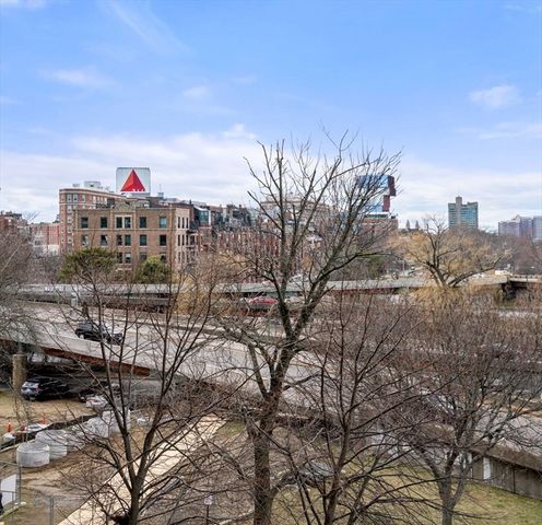 a view of a city with tall buildings